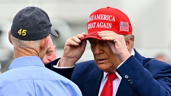 NASCAR fans cheer as Trump arrives for Daytona 500 in Air Force One