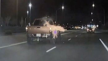 Truck passenger shoots fireworks at car in alleged road rage incident caught on video