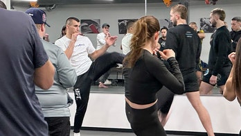 Israeli UFC fighter talks antisemitism at self-defense seminar as Hamas hostages mark 500 days