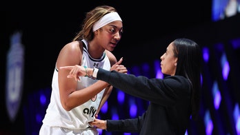 Angel Reese screams at coach after fouling out, then tells critics to 'stay on that side'