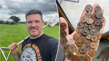 Plumber stumbles across hoard of ancient coins in field: 'Once in a lifetime find'