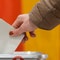 Conservative candidate pulls ahead in German election, according to early exit polls