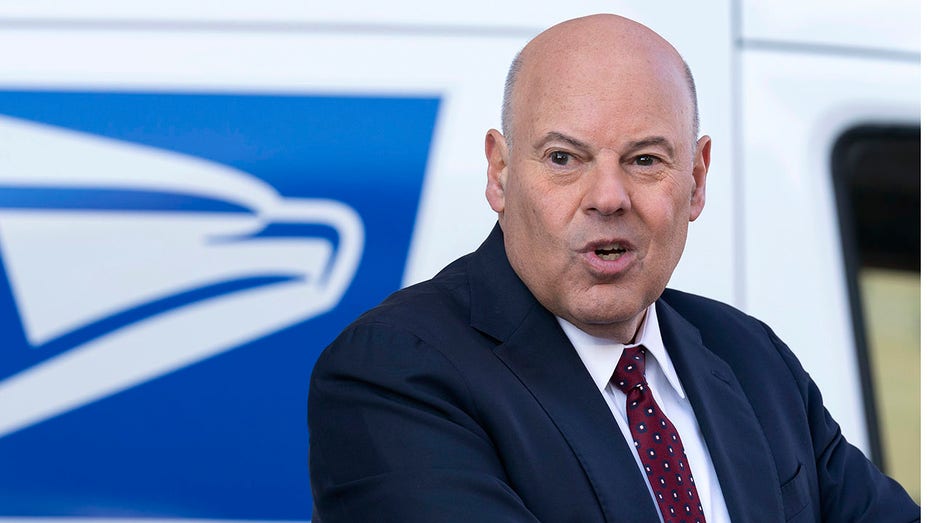 Postmaster General Louis DeJoy stepping down amid US Postal Service financial turmoil