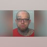 A mugshot of Tyler Collins