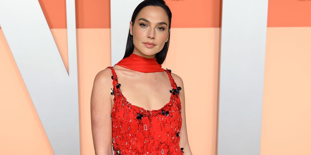 gal gadot orange dress Gal Gadot was 'scared to death' after learning about blood clots in her  brain at 8 months pregnant