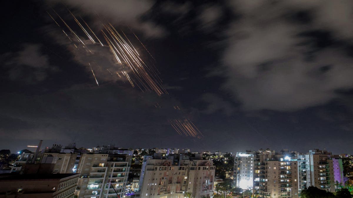 Israel's Iron Dome anti-missile system intercepts rockets after Iran fired a salvo of ballistic missiles, as seen from Ashkelon, Israel, October 1, 2024