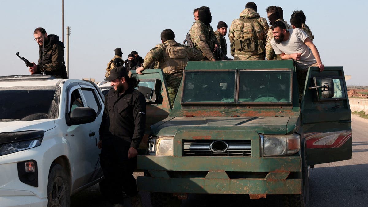 Syrian army in passenger vehicles