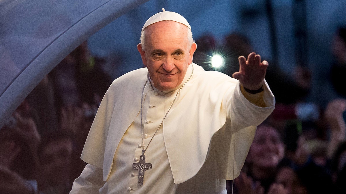 Pope Francis waving