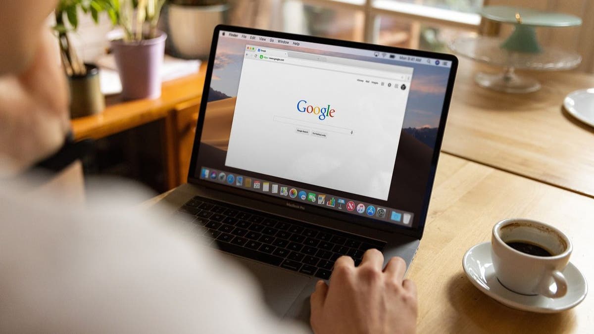 man working on laptop