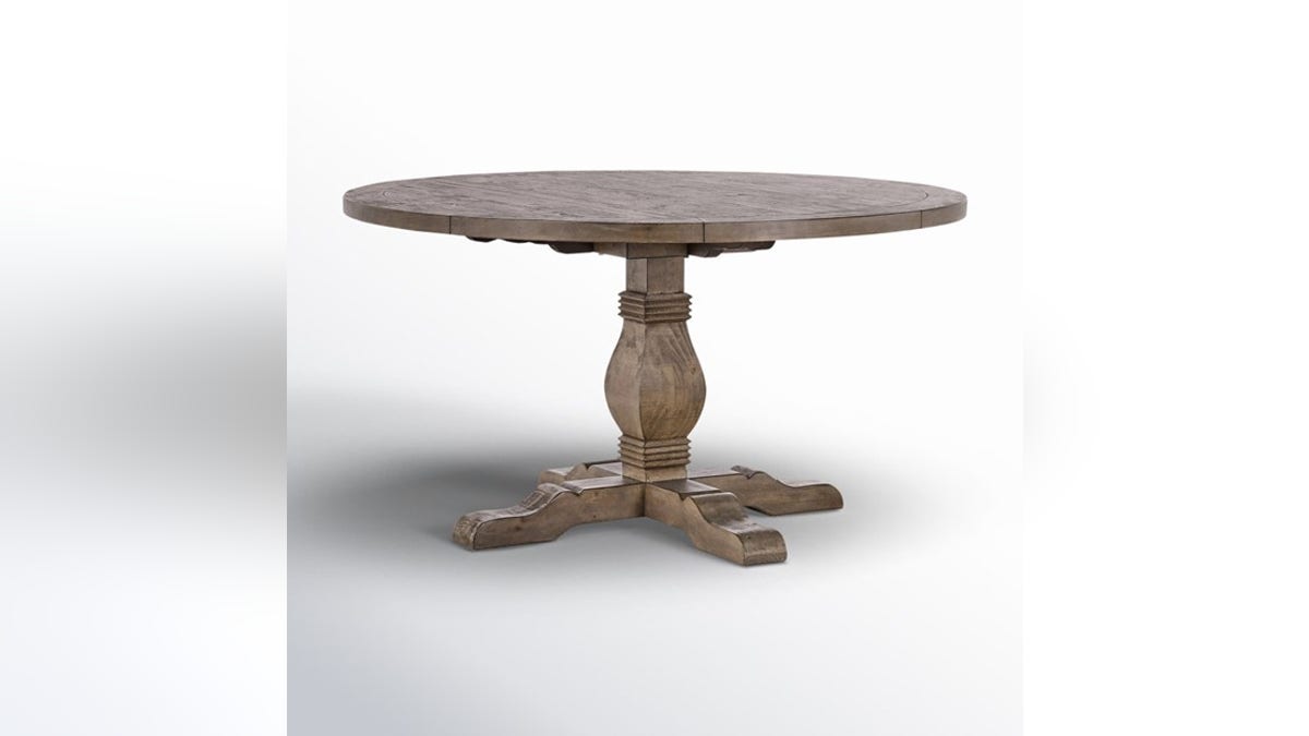 Fit a family of four around this gorgeous pedestal table.