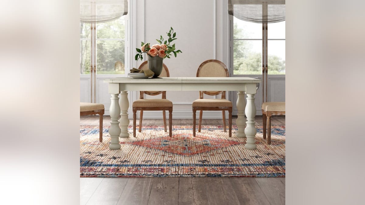 Add this beautiful French-style table to your dining room or kitchen.