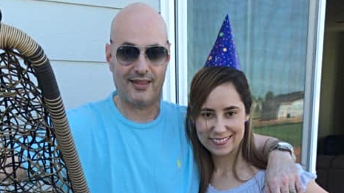 Richard and Lina Samarel pose together