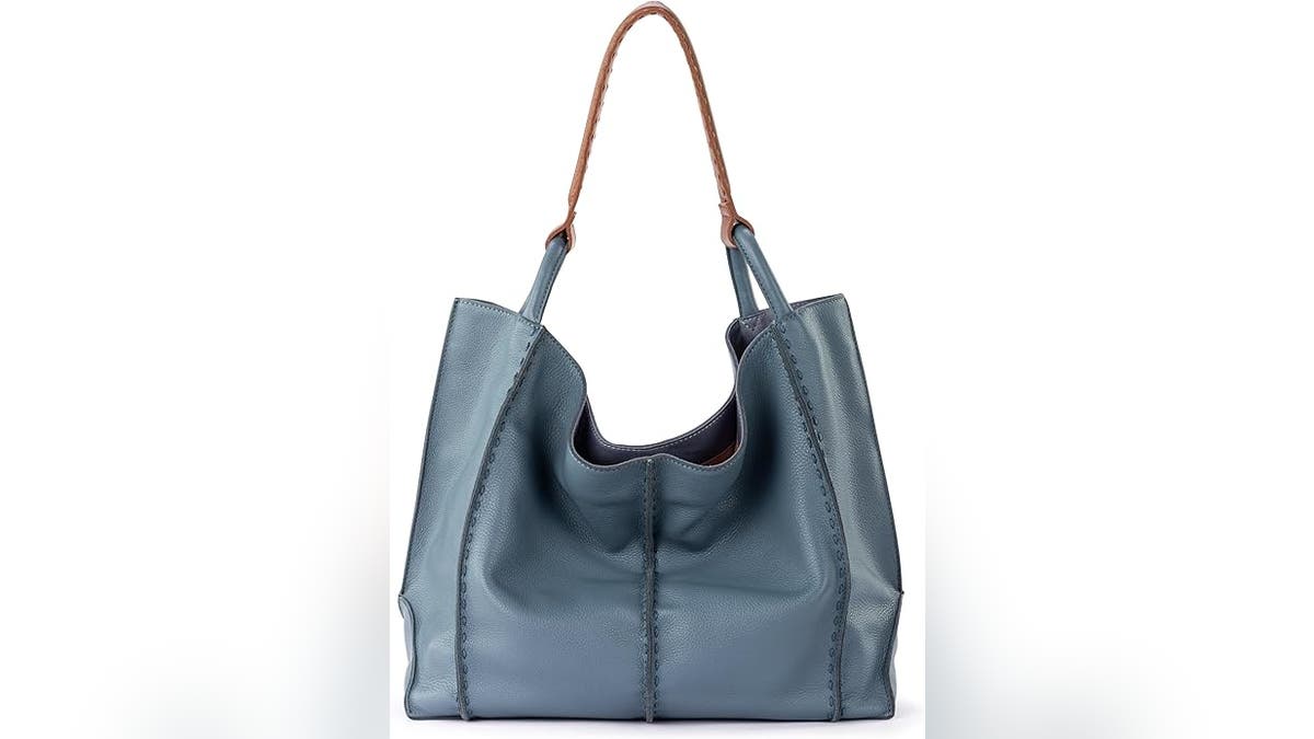 Combining ethical manner pinch trendy design, The Sak’s vegan leather tote offers a freely interior and a soft, slouchy feel.