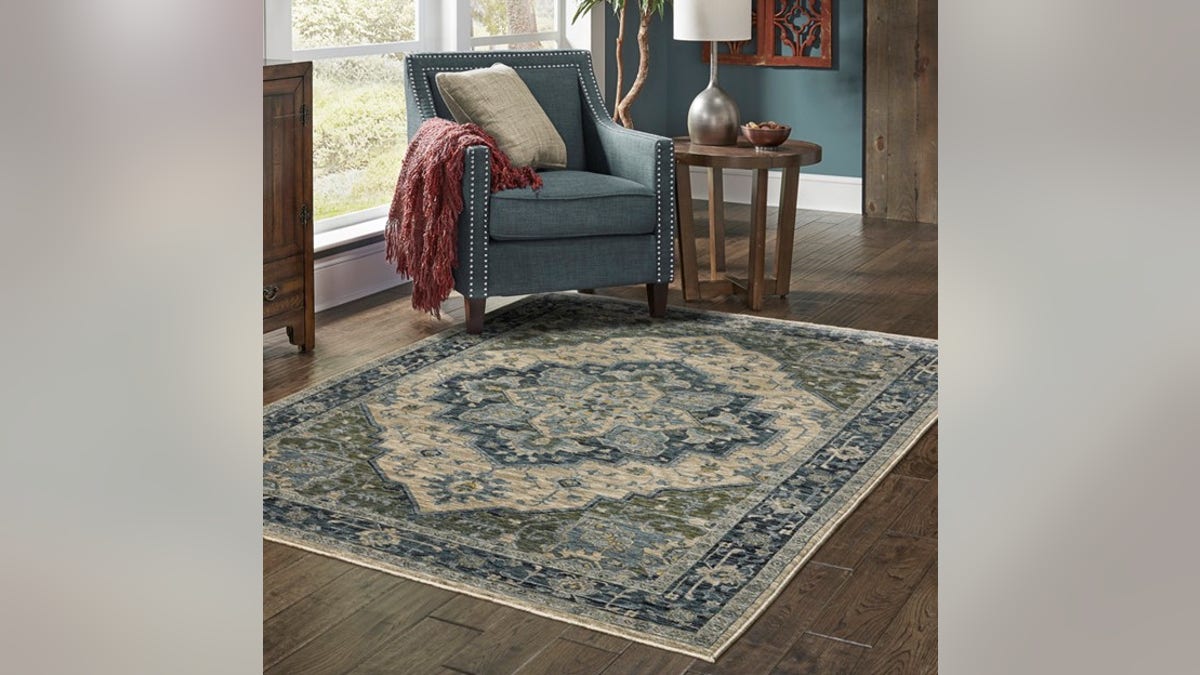 The bright blues in this rug make it stand out.?