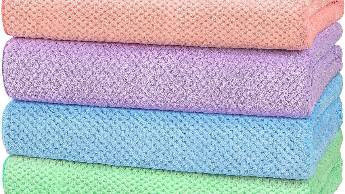 This set of microfiber towels by HOMEXCEL at Amazon is made from synthetic fibers that are both lightweight and highly absorbent.