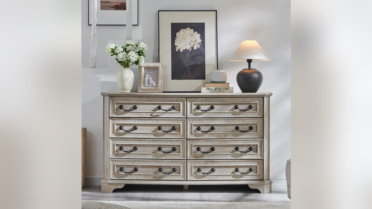 A dresser with plenty of storage space and a vintage design.