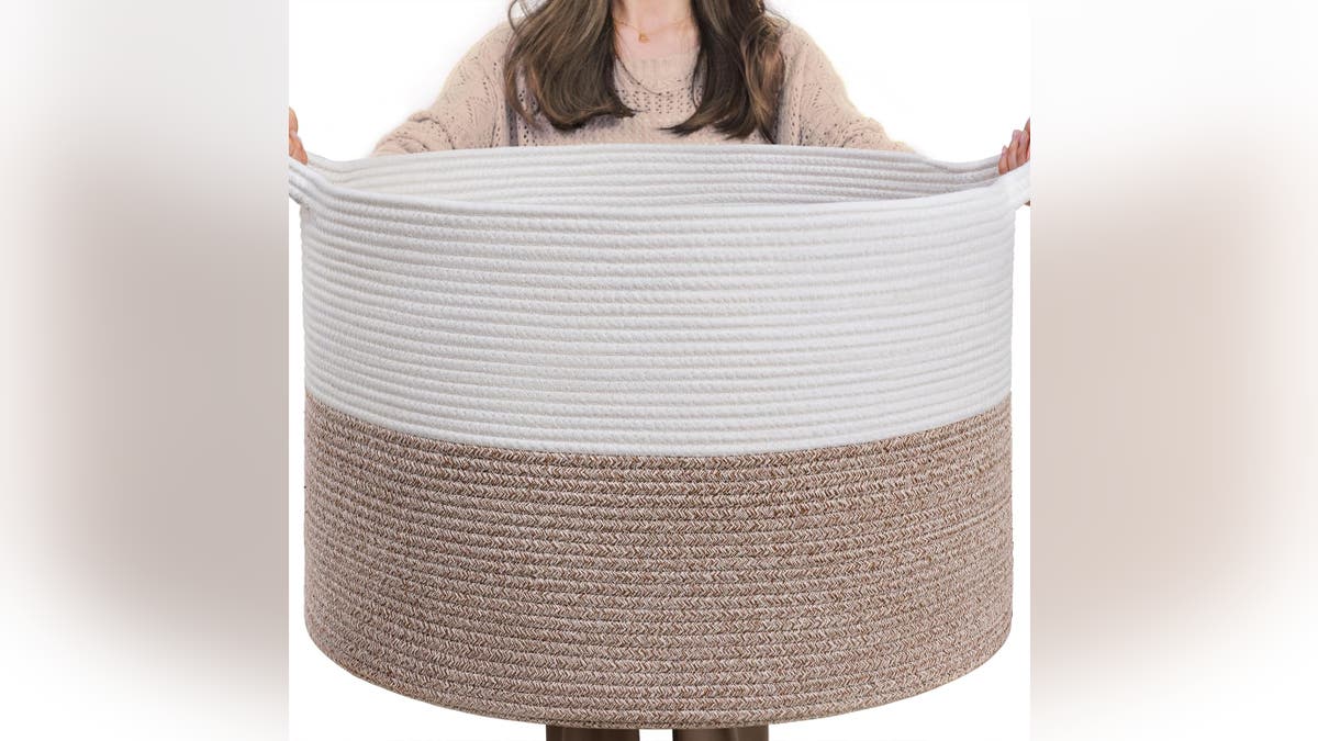 Keep blankets and pillows in this oversized basket. 