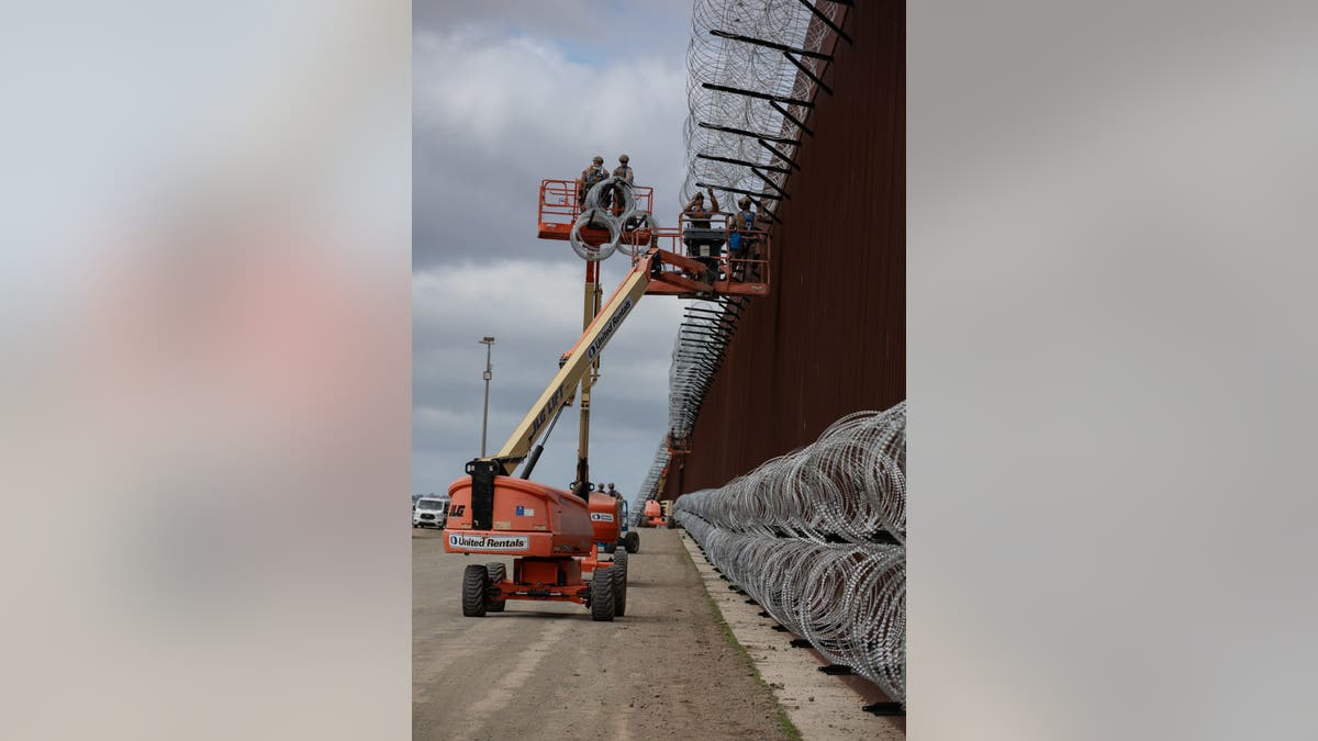 Marines install razors on top of border wall