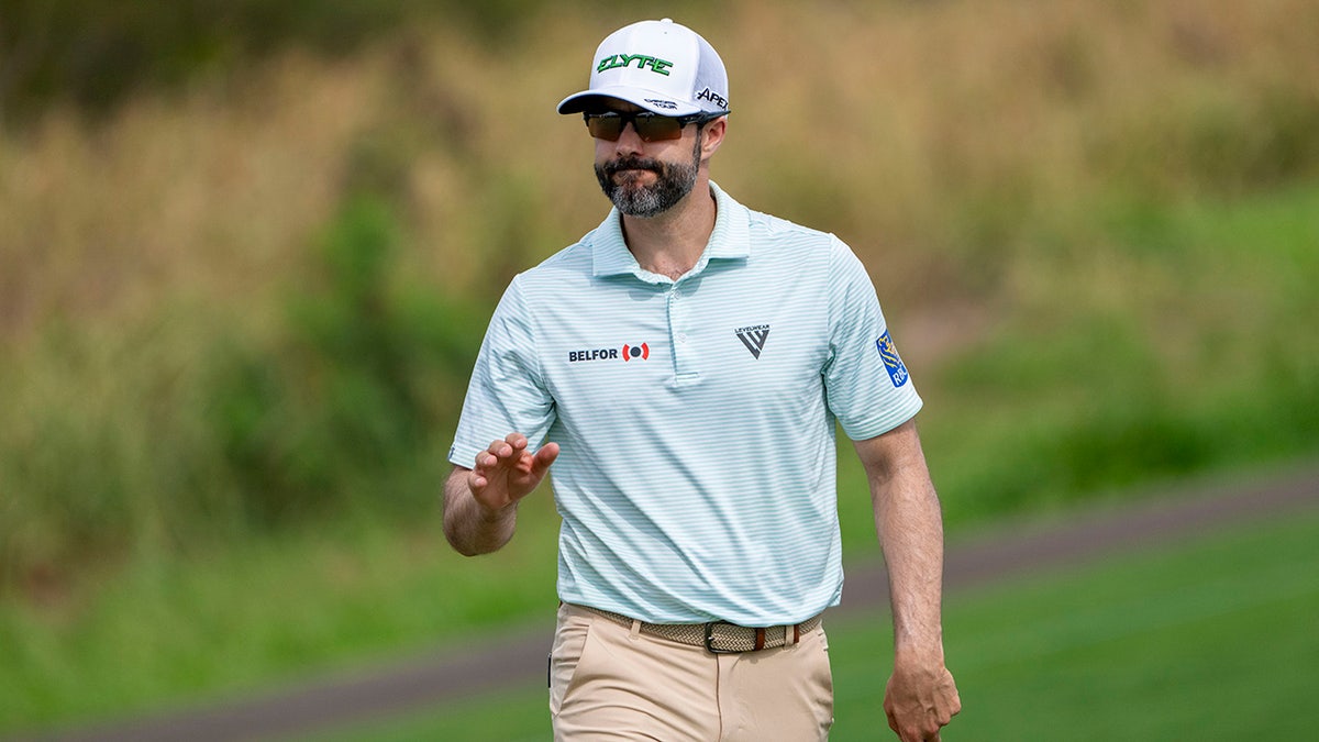 Adam Hadwin recognizes the crowd