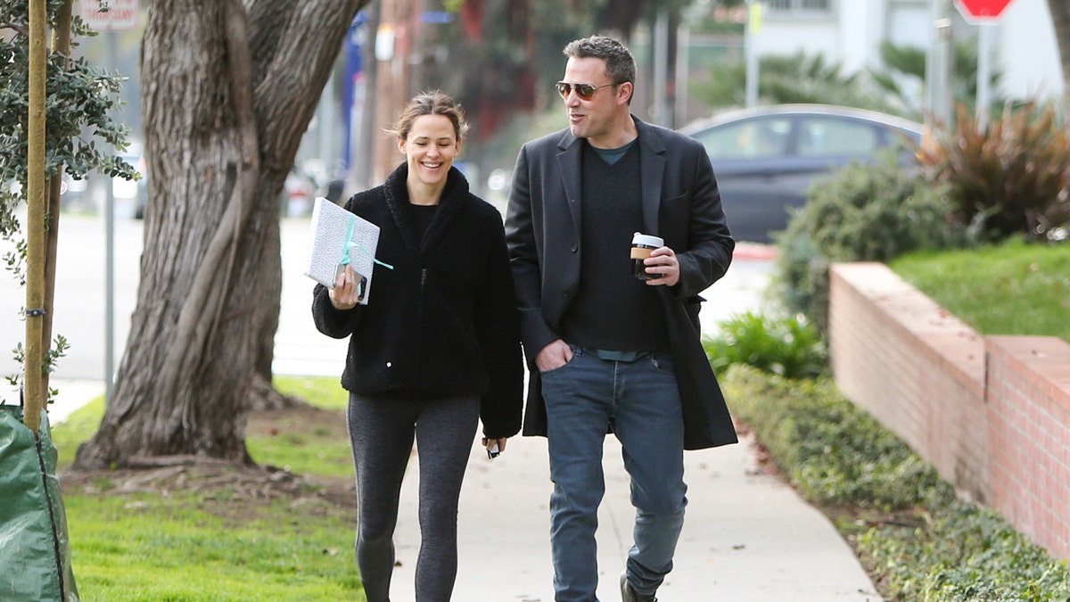 Jennifer Affleck and Ben Affleck on a walk