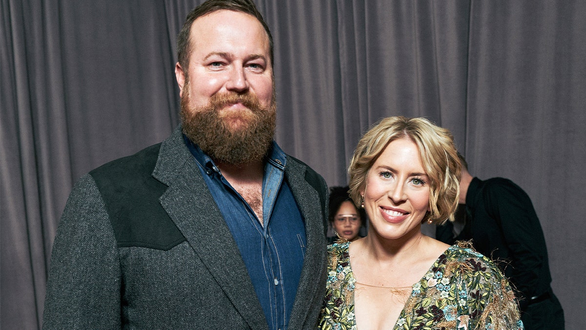 HGTV stars Ben and Erin Napier smiling at an event