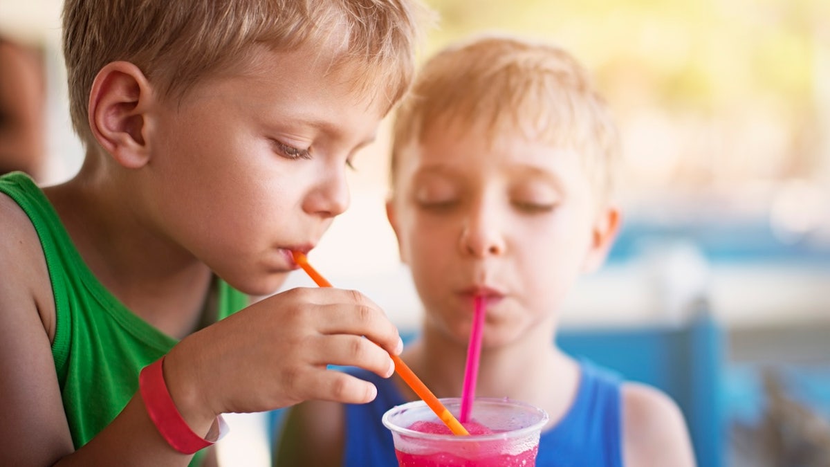 Boys drinking slushy