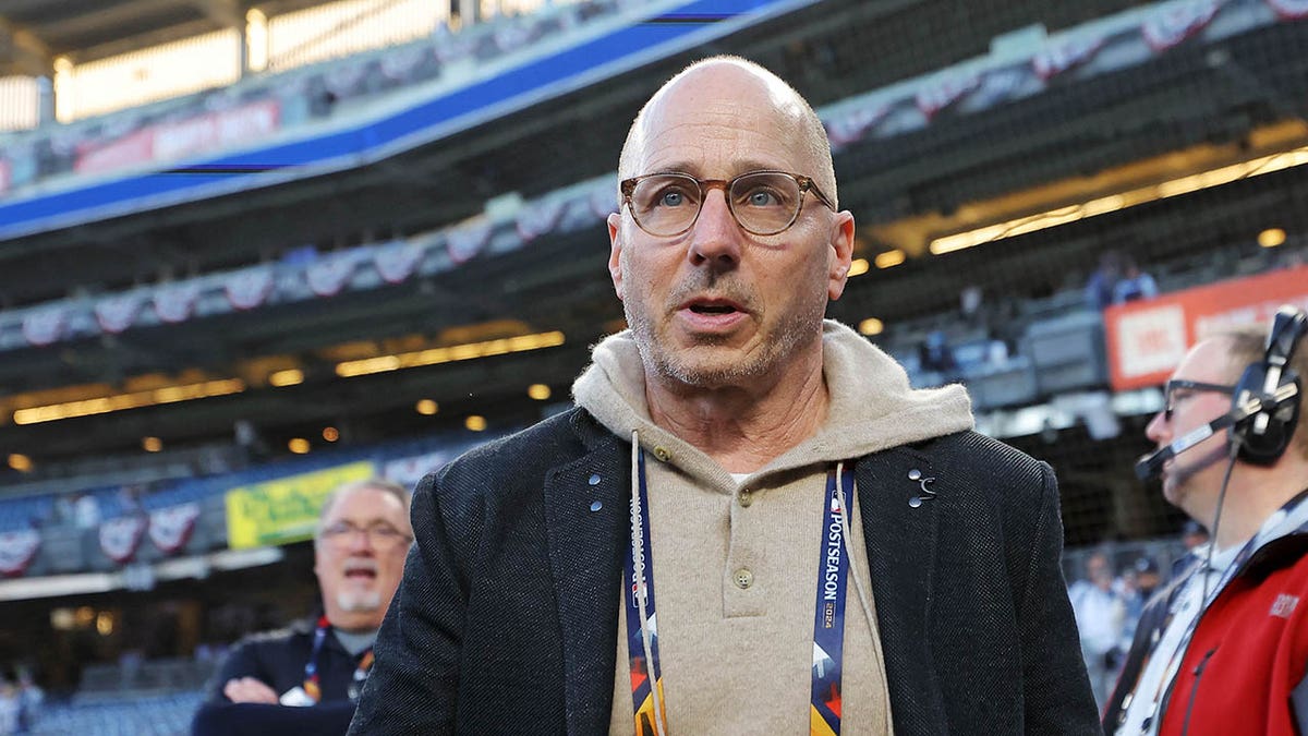 Brian Cashman looks out on field