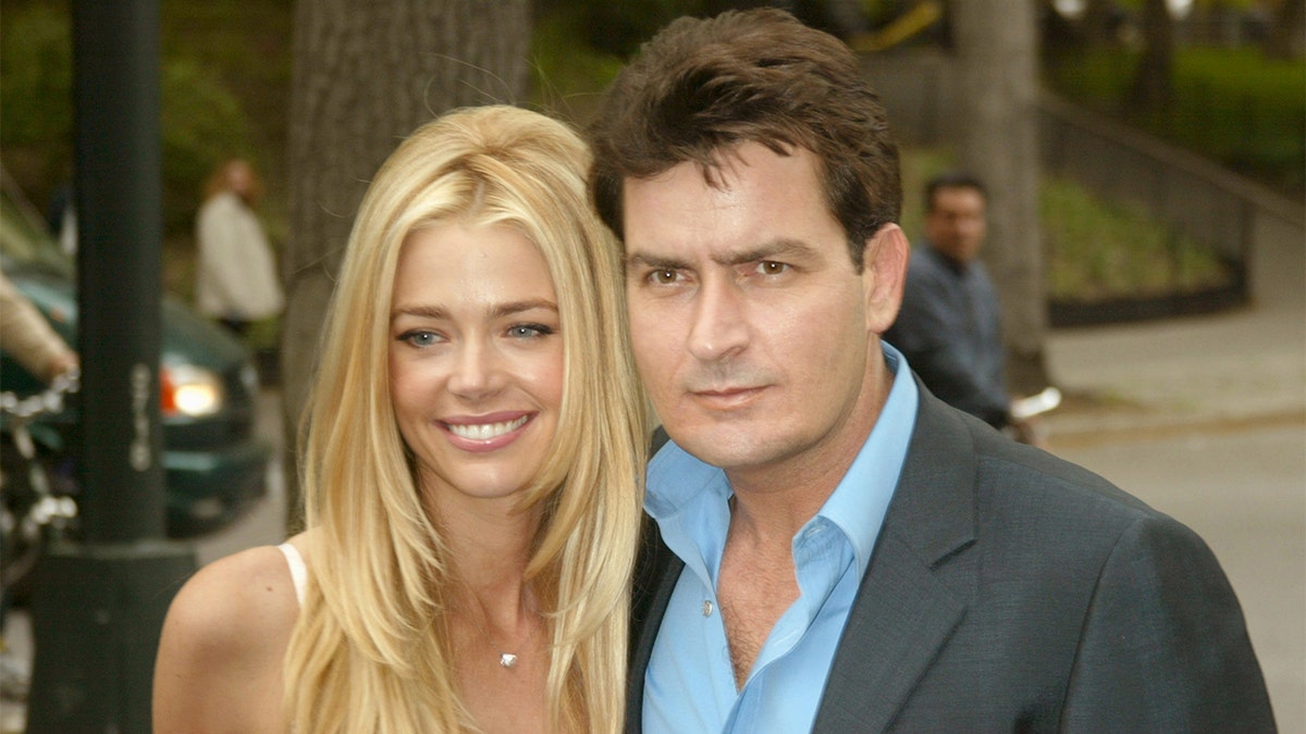 Denise Richards and Charlie Sheen smiling