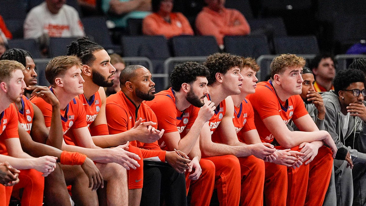 Clemson players at the bank