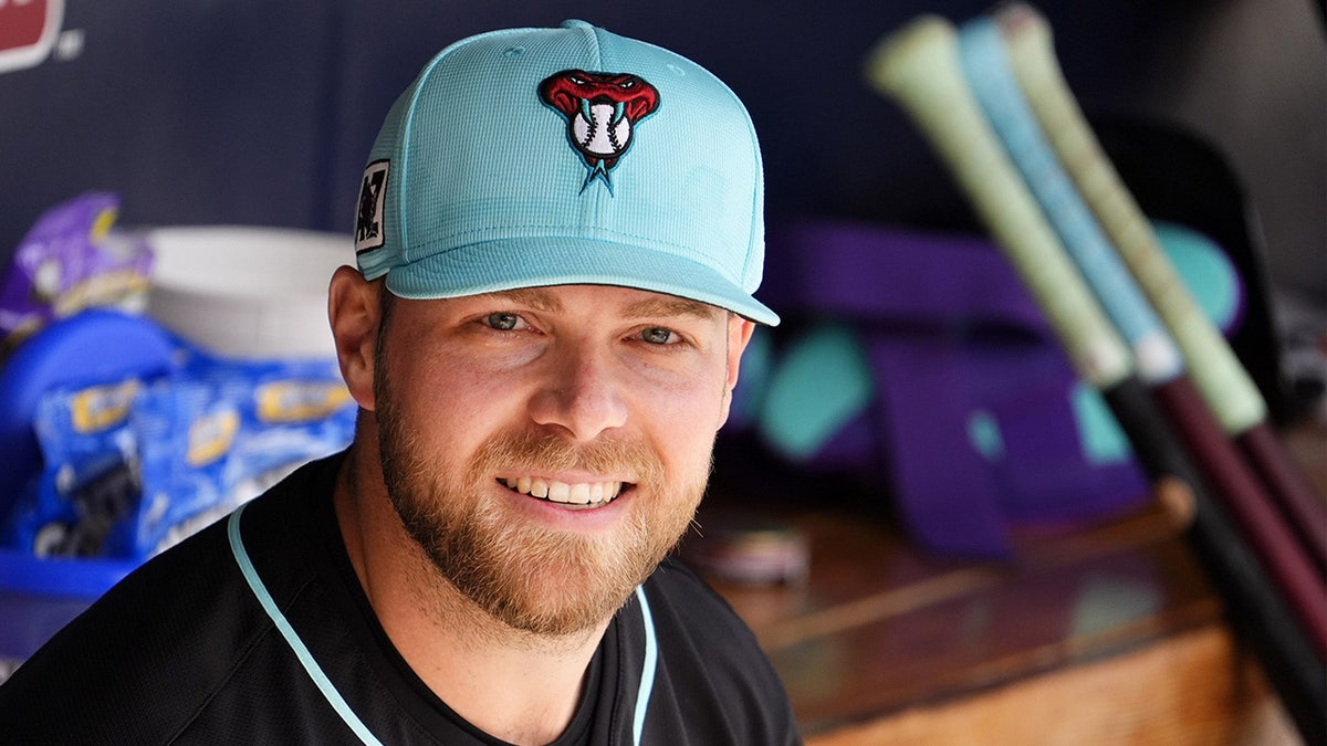 Corbin Burnes looks on
