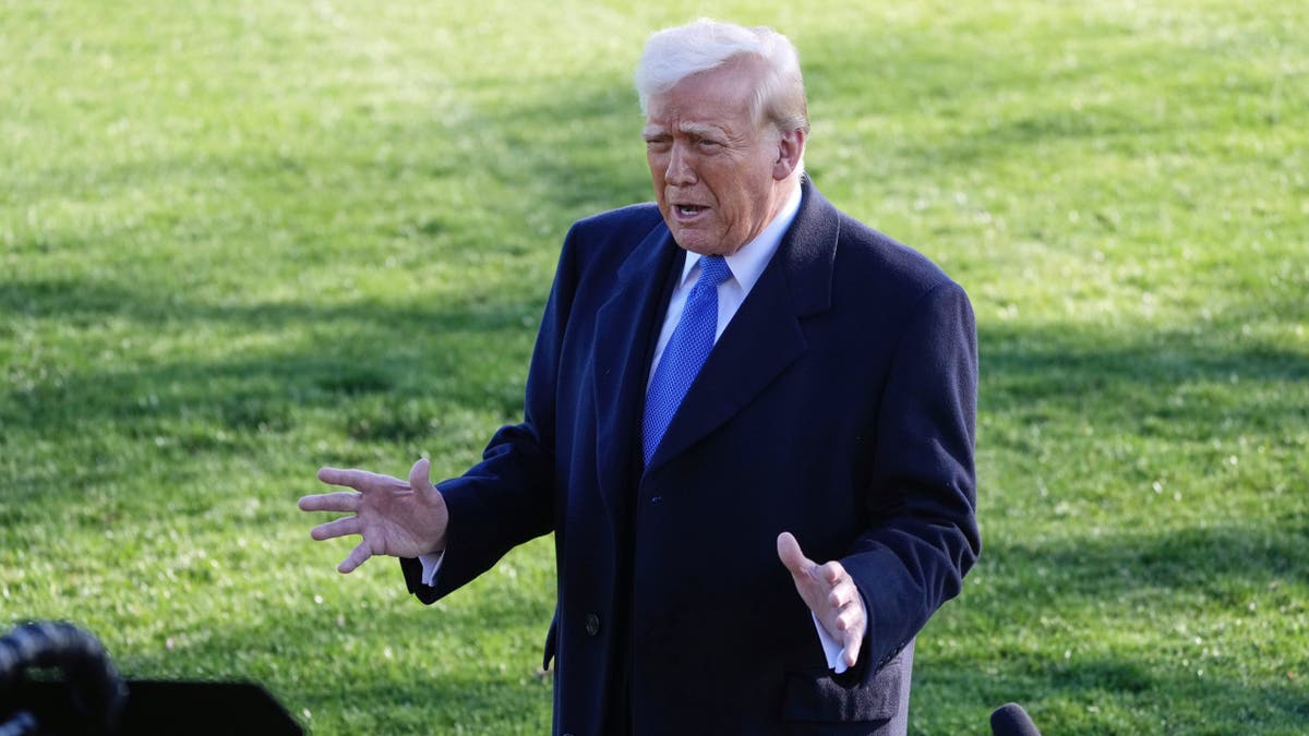 President Donald Trump speaks with reporters before departing on Marine One en route to New Jersey on Friday, Mar. 21, 2025 in Washington, D.C.