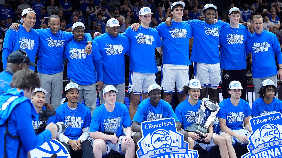 Duke Blue Devils pose after win