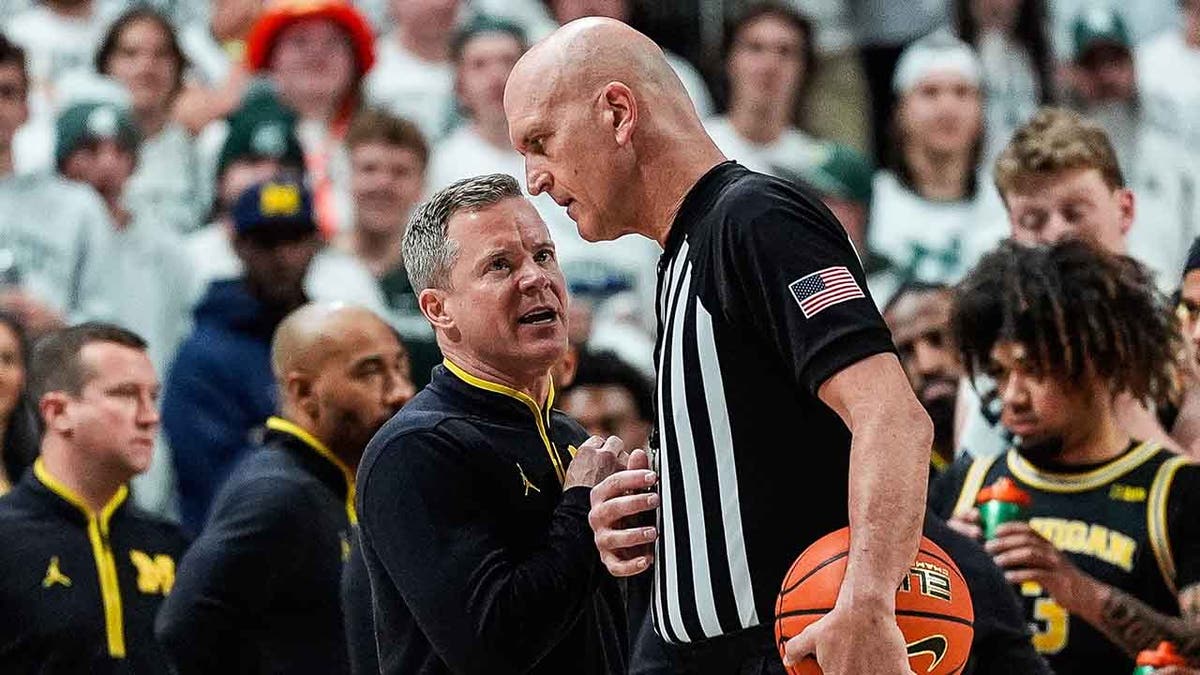 Dusty May talks to the referee