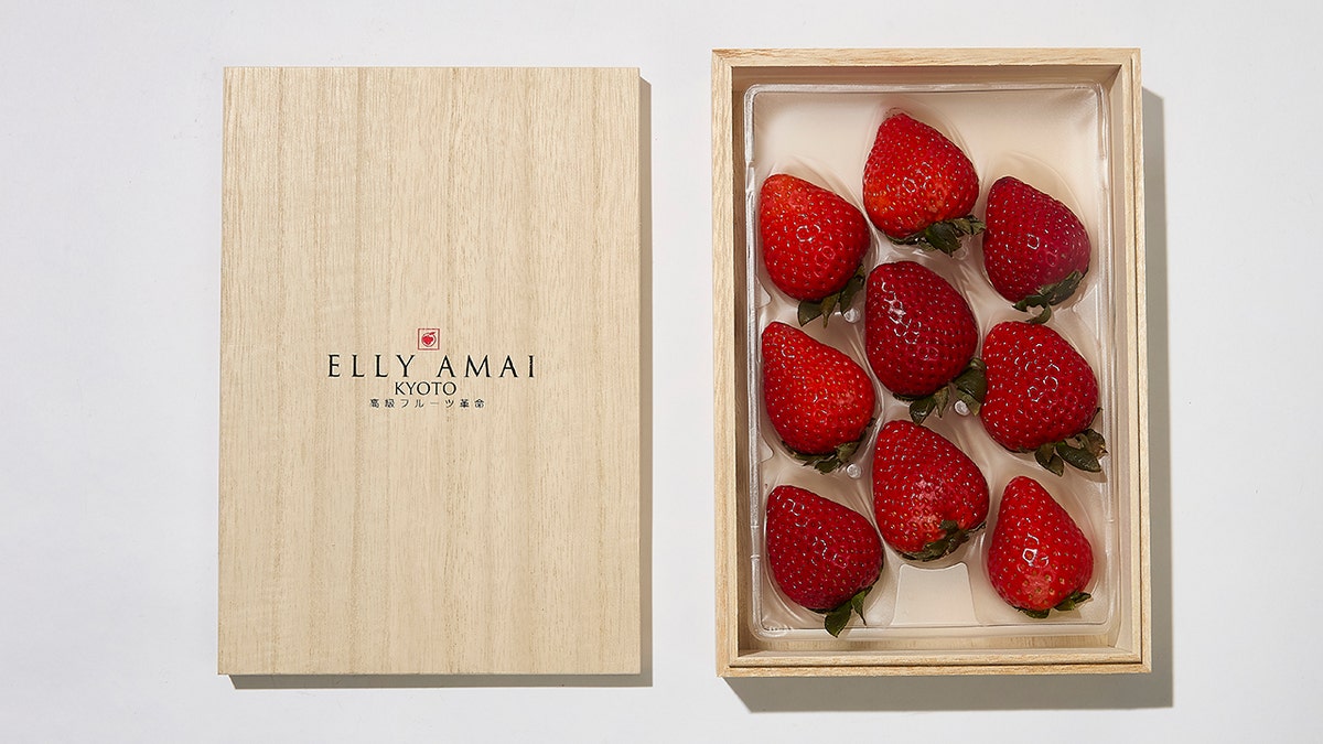 elly amai strawberries in a box