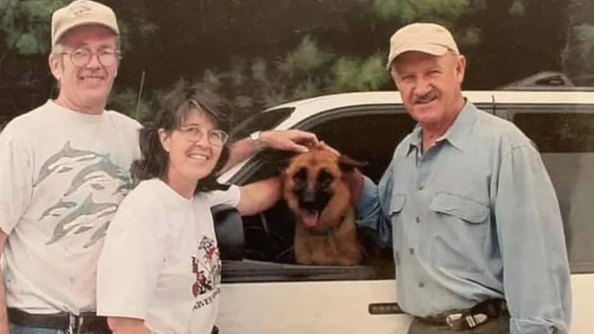 Photos of Gene Hackman with the dog