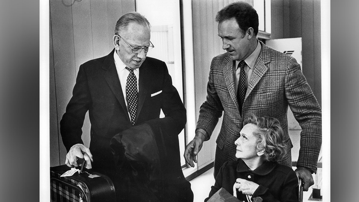 Melvyn Douglas and Gene Hackman at airport with Dorothy Stickney in a scene from the film 'I Never Sang For My Father', 1970