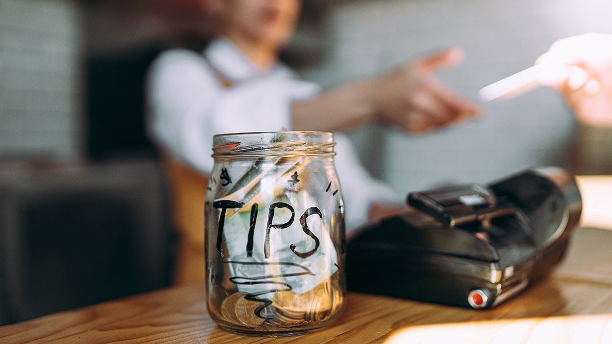 Tip the jar at the checkout counter