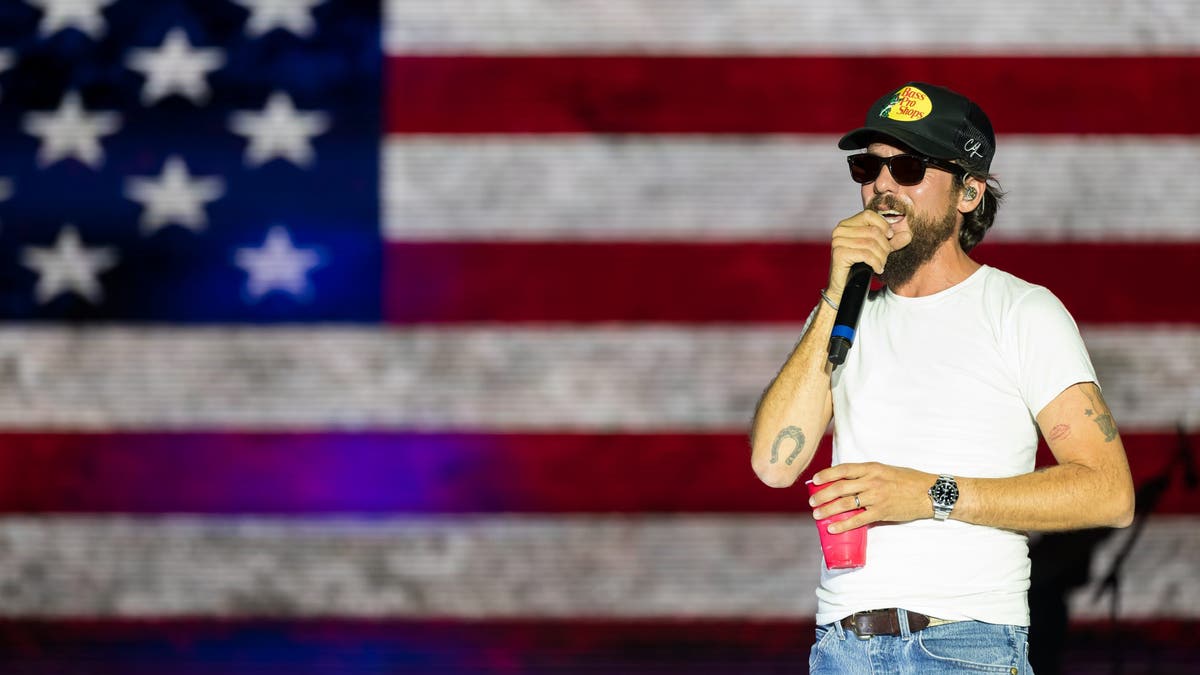 Chris Janson with flag background