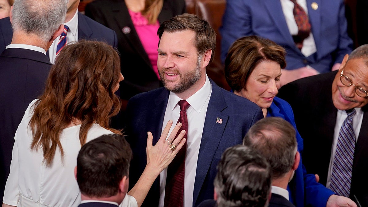 Representative Nancy Mace, a Republican from South Carolina, and Vice President JD Vance speak while arriving for a joint session of Congress in the House Chamber of the US Capitol in Washington, D.C., March 4, 2025.?