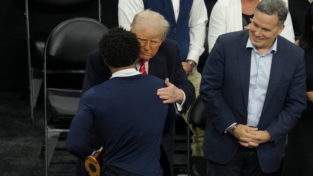 Trump embraces wrestlers