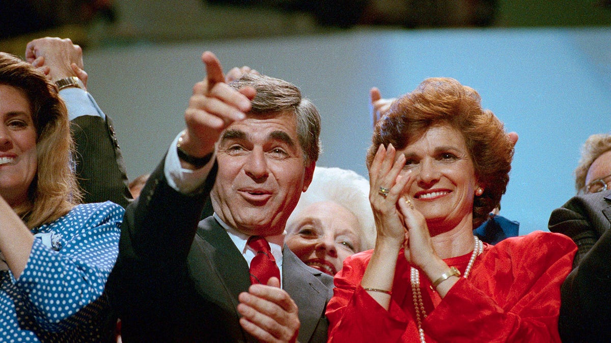 Michael and Kitty dukakis on the DNC stage