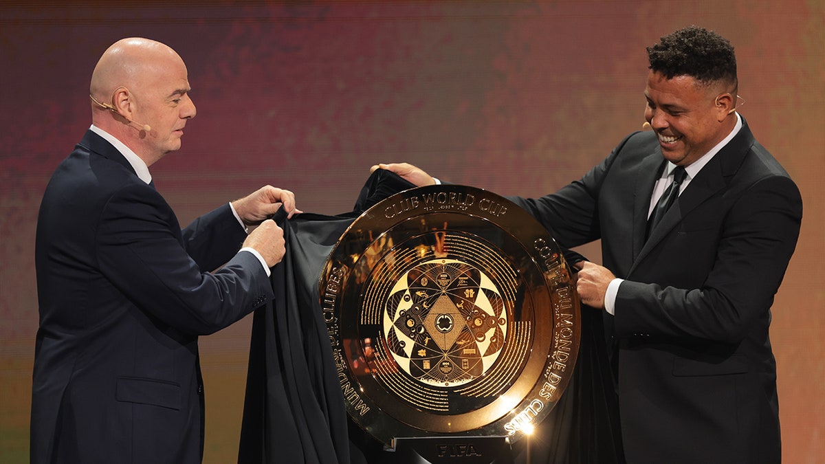 Gianni Infantino with the trophy