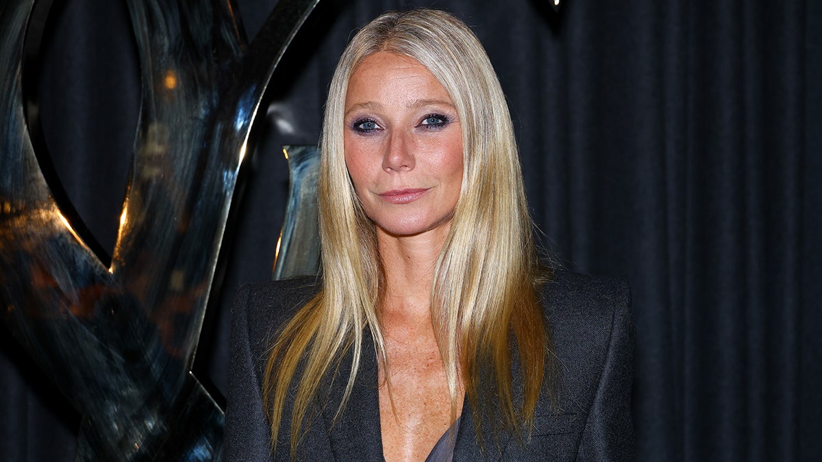 Gwyneth Paltrow wearing dark gray suit jacket