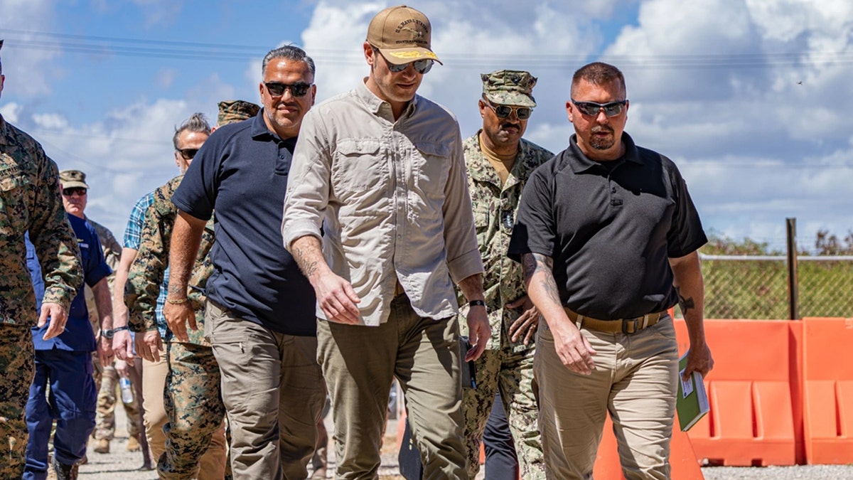 Pete Hegseth at Guantanamo Bay with other officials