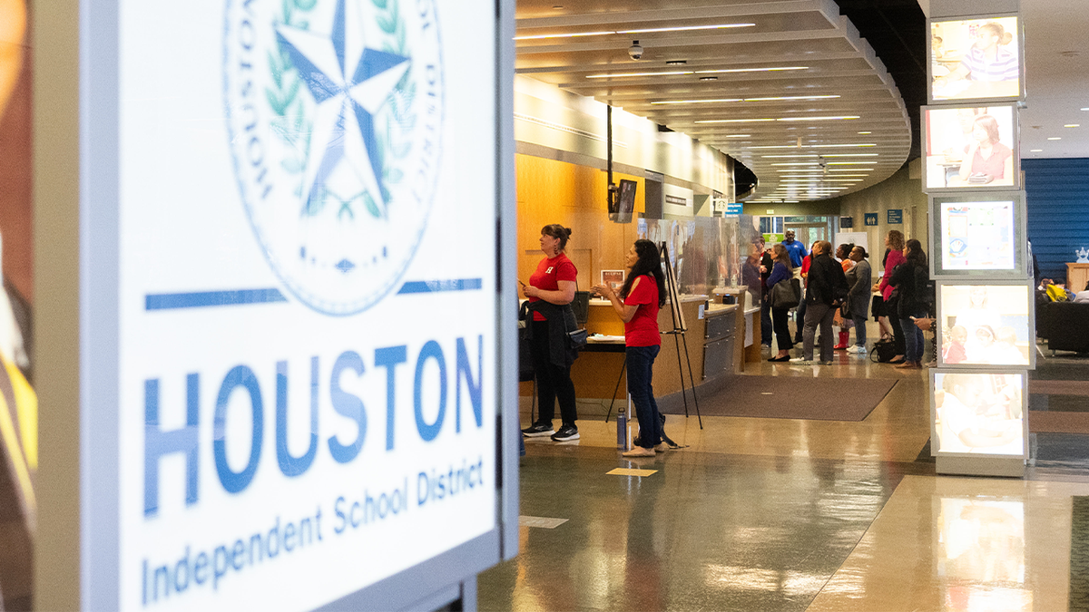 Houston Independent School District logo on sign.