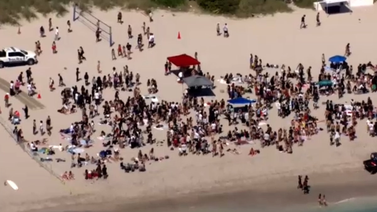 A large crowd on Sunny Isles Beach on March 21