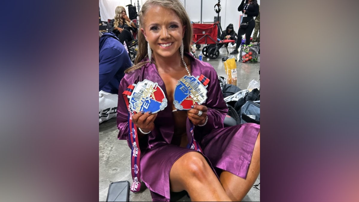 Jodi Vance shows off medals