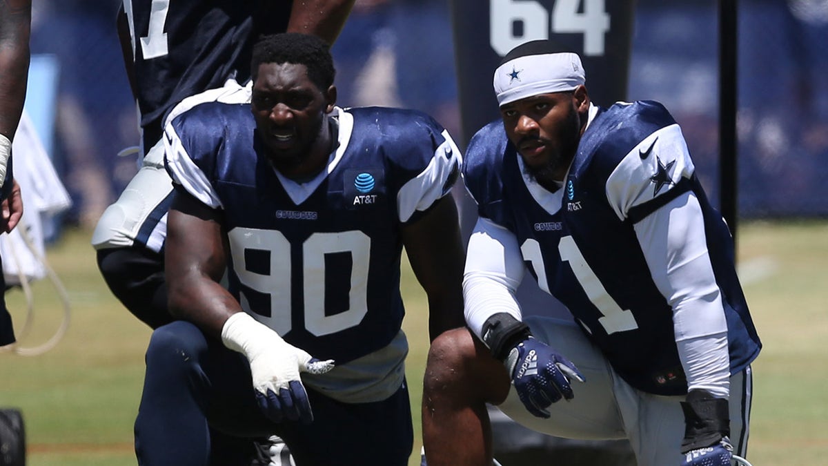 DeMarcus Lawrence and Micah Parsons