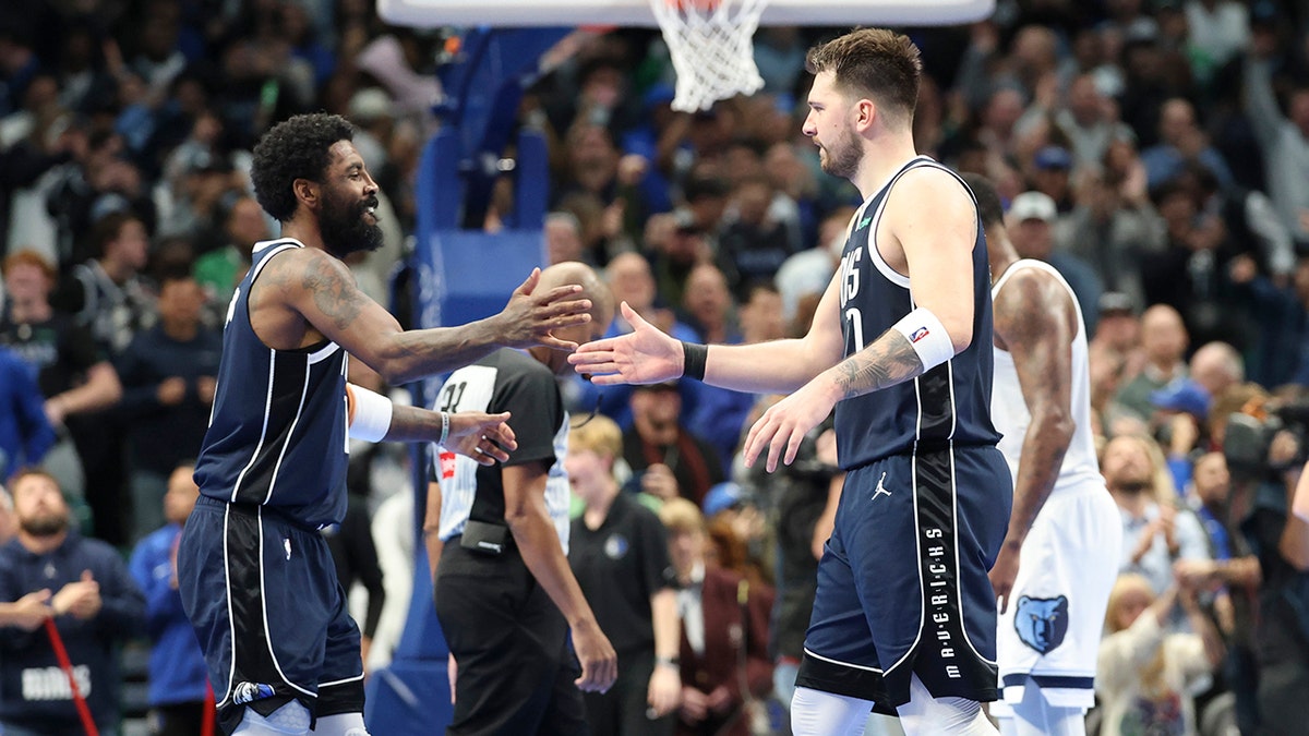 Luka Doncic and Kyrie Irving High-Five