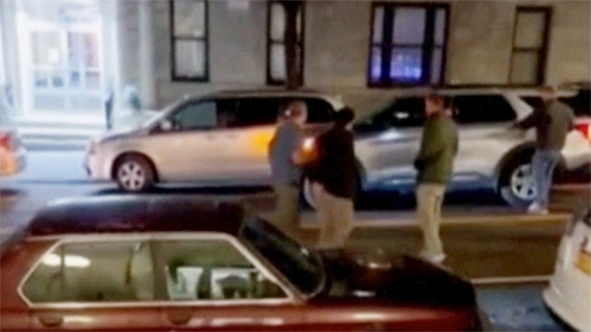 Mahmoud Khalil outside his apartment building following arrest